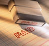 Piece of paper with a stamp that says "Paid"